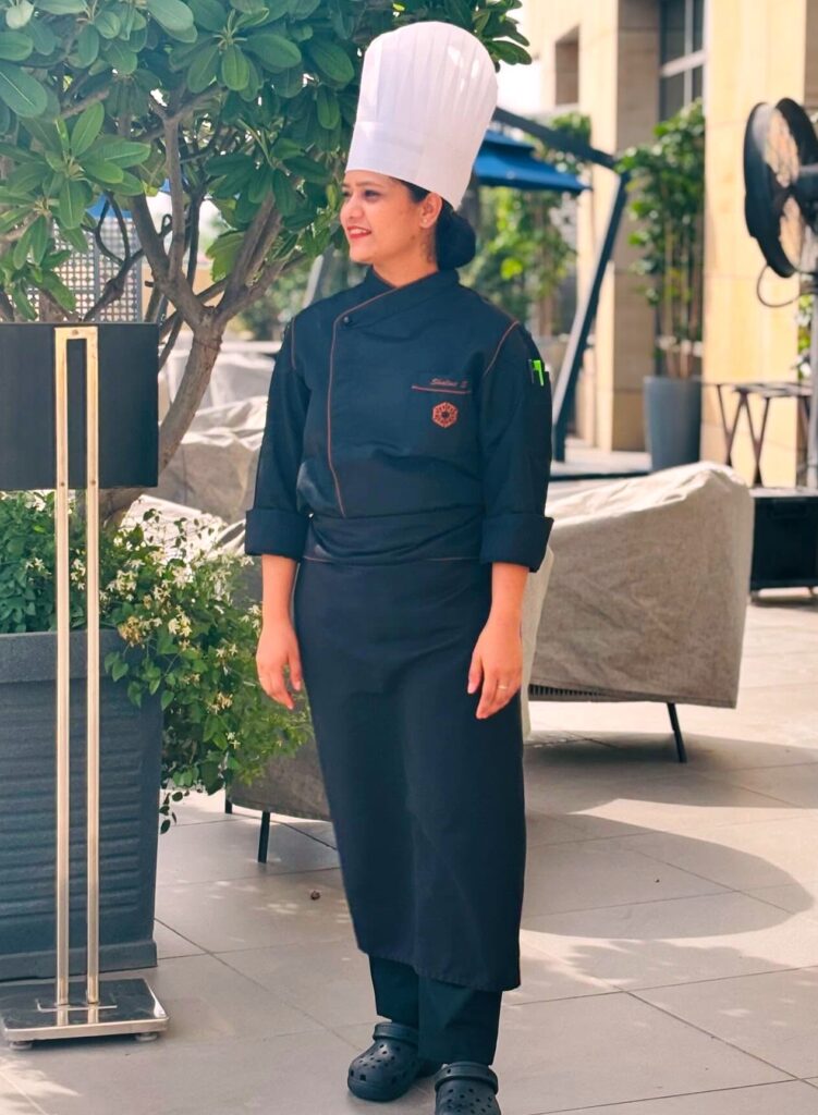 Shalini Singh in her chef uniform — original photograph